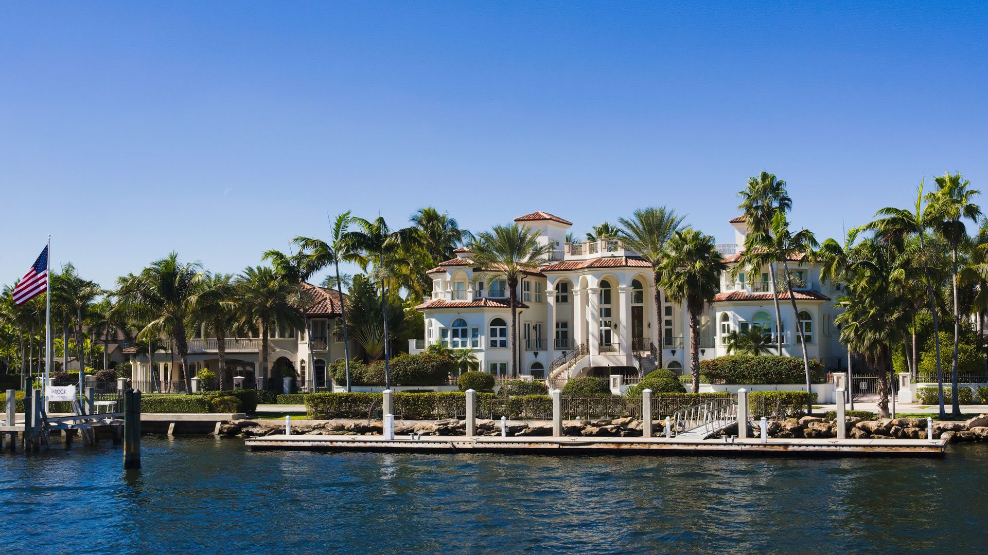 Lush green sod lawn at a waterfront Florida estate
